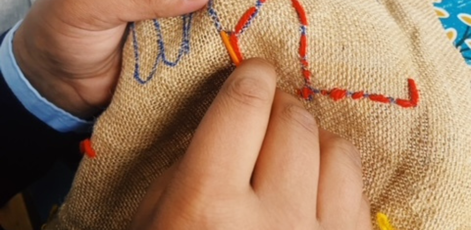 Student from Our Lady of Mercy Primary School, Sligo sewing TAP 2022.jpg