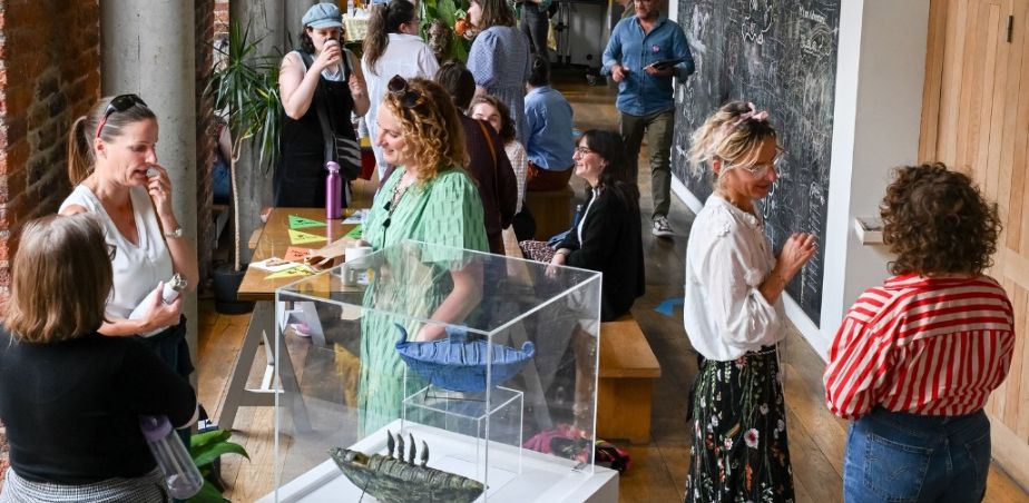 People chat at TYAI members gathering at the Ark Dublin