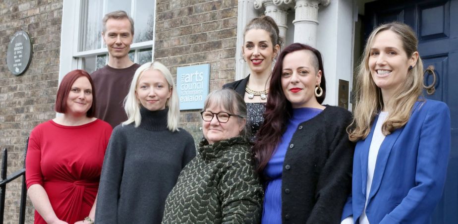 Arts Councils artists in residence 2025 standing outside the Arts Council building including it's Georgian façade.