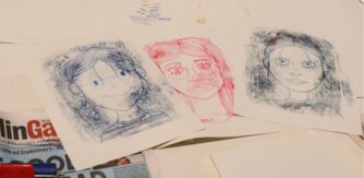 National Gallery of Ireland TY Programme, 3 drawings of faces on a table.